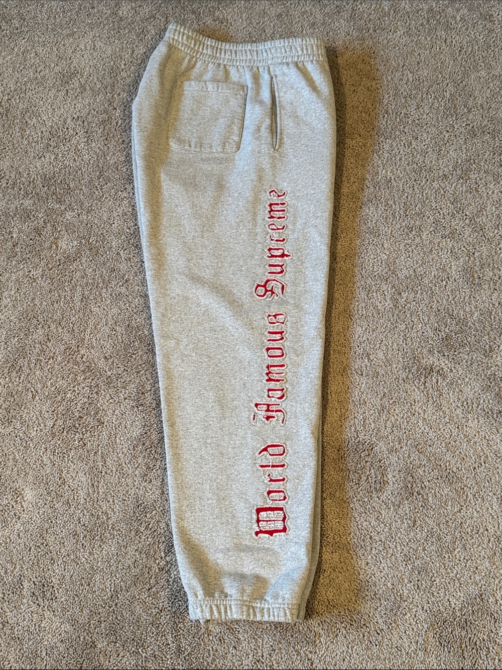 Supreme Gray Sweatpants with Red Script Side Logo